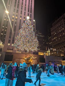 skating in front of the Rockefeller Center tree